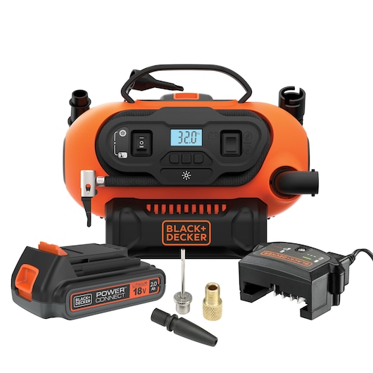 A BLACK+DECKER portable air compressor kit with digital display, orange and black color, shown with an 18V lithium battery, charger, and multiple nozzle accessories.