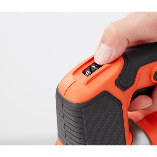BLACKDECKER BES610 sander close-up showing speed control dial being adjusted.