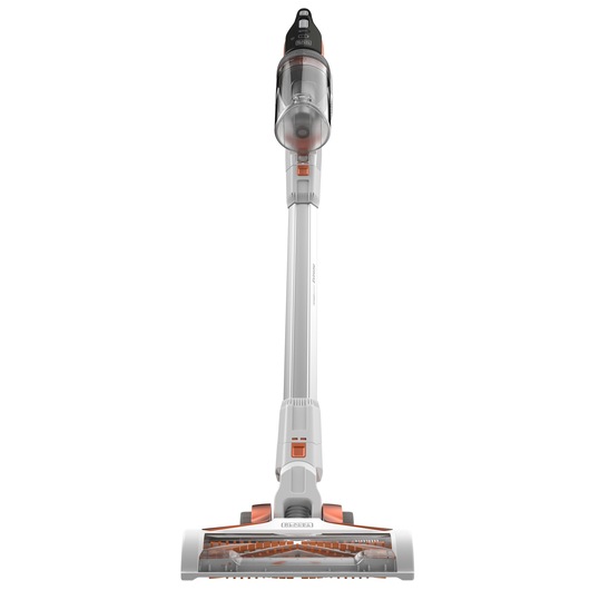 Front view of a BLACK+DECKER cordless stick vacuum cleaner, showing its white and orange design with a transparent dust container and brush head.
