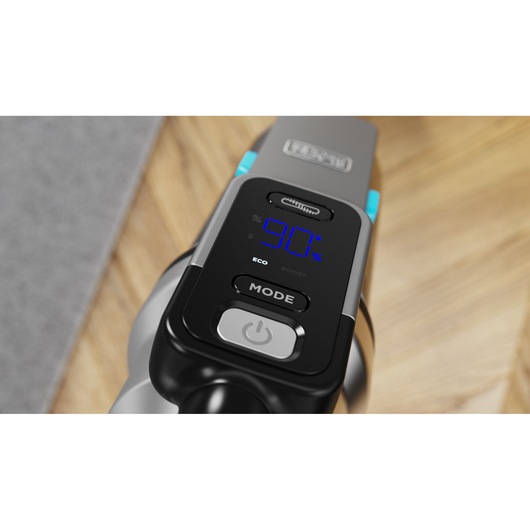 BLACKDECKER BSV520BRB vacuum cleaner close-up showing digital display with blue screen and control buttons on wood floor.