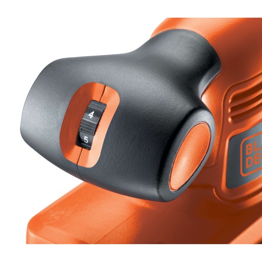 BLACKDECKER KA274EKA sander speed control dial, close-up angle, orange and black casing.