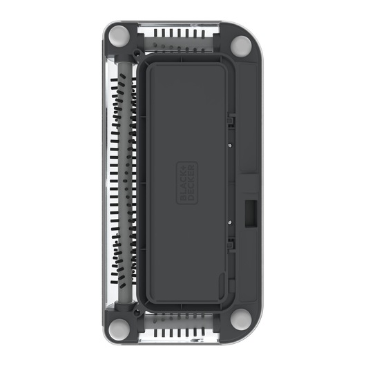 Top view of a BLACK+DECKER PSA215B photography accessory, showing its rectangular shape, dark cover with the brand logo, and visible cylindrical brush rollers at both ends.